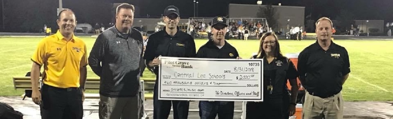 Central Lee Music and Athletic Boosters donation from Pilot Grove Savings Bank directors, officers and staff